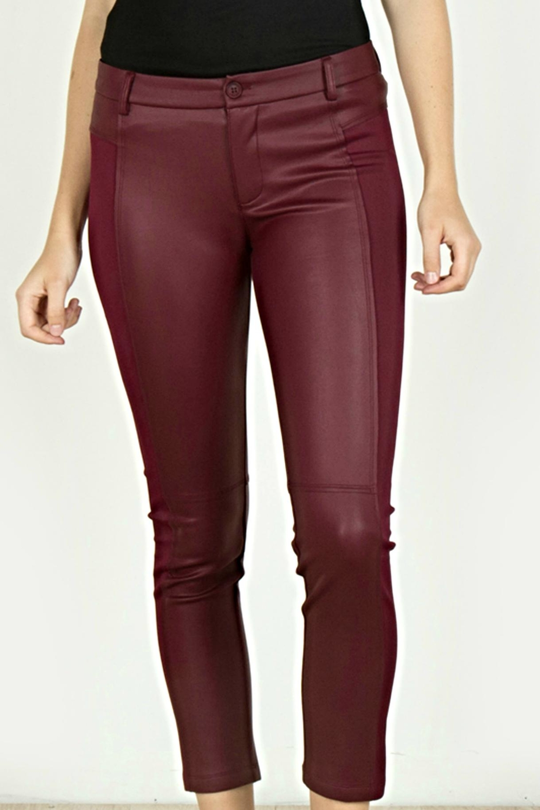 maroon top grey pants